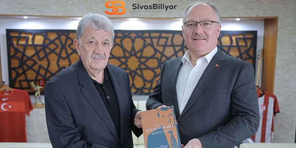 Toparlı, Başkan Bilgine kendi kitabını takdim etti